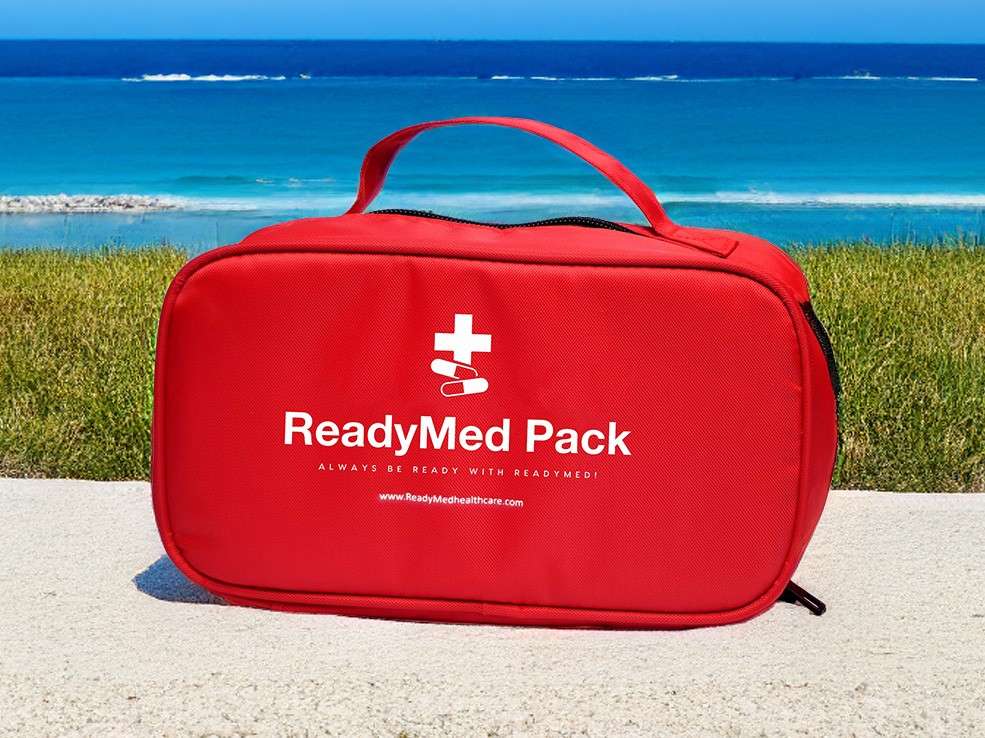 ReadyMed Travel Pack in front of a beach scene